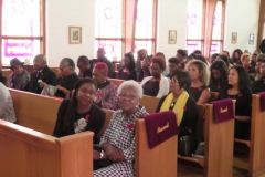 Family members and well  wishers in attendance at St. Ambrose Episcopal Church, Raleigh NC, for the  funeral service of the late Levi Bowen on Oct. 20, 201