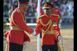 Former Chief of Defence Staff Major General Antony Anderson (left) passes the command of the Jamaica Defence Force to Major General Rocky Meade at the Jamaica Defence Force Change of Command Parade